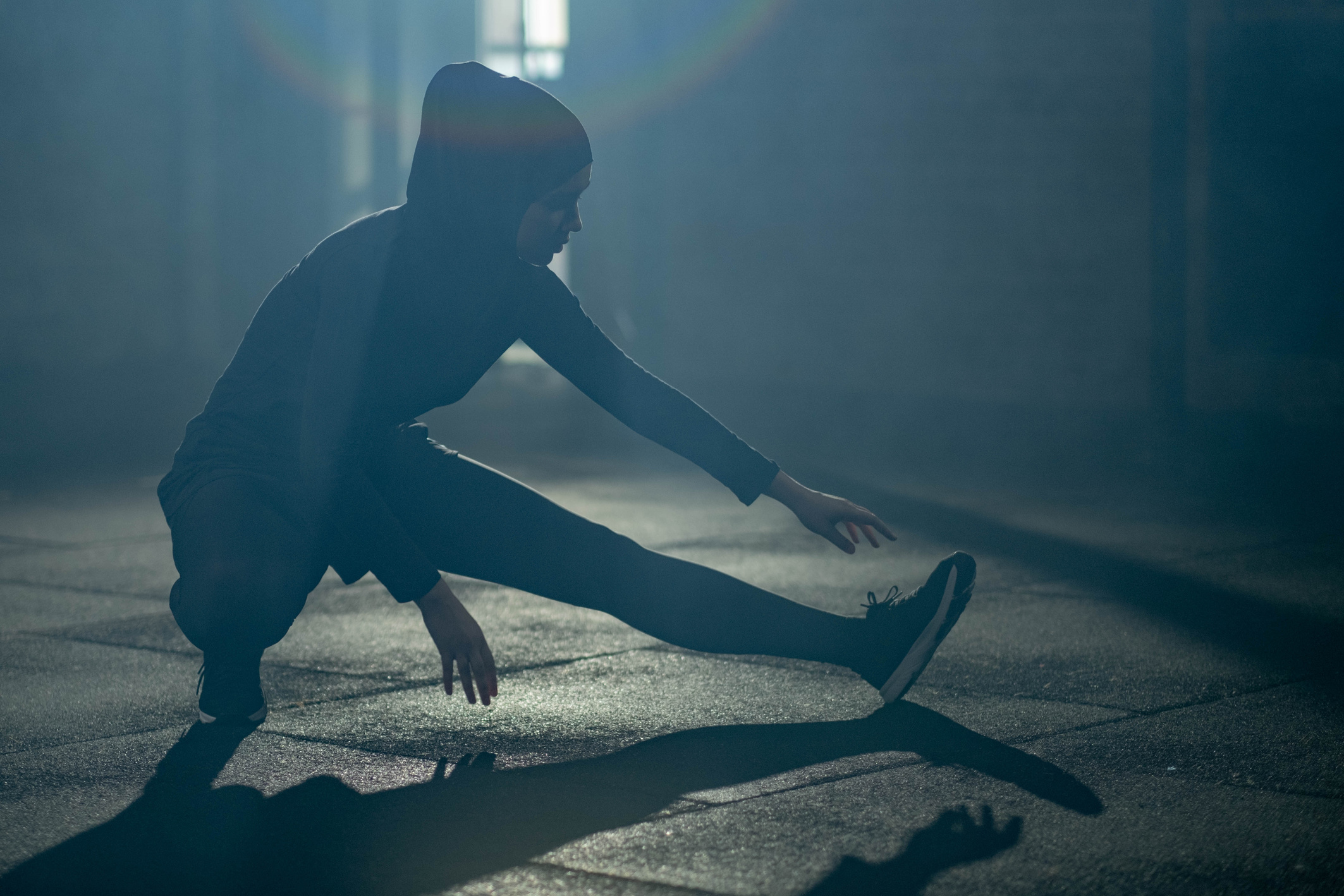 Woman in Black Activewear Exercising
